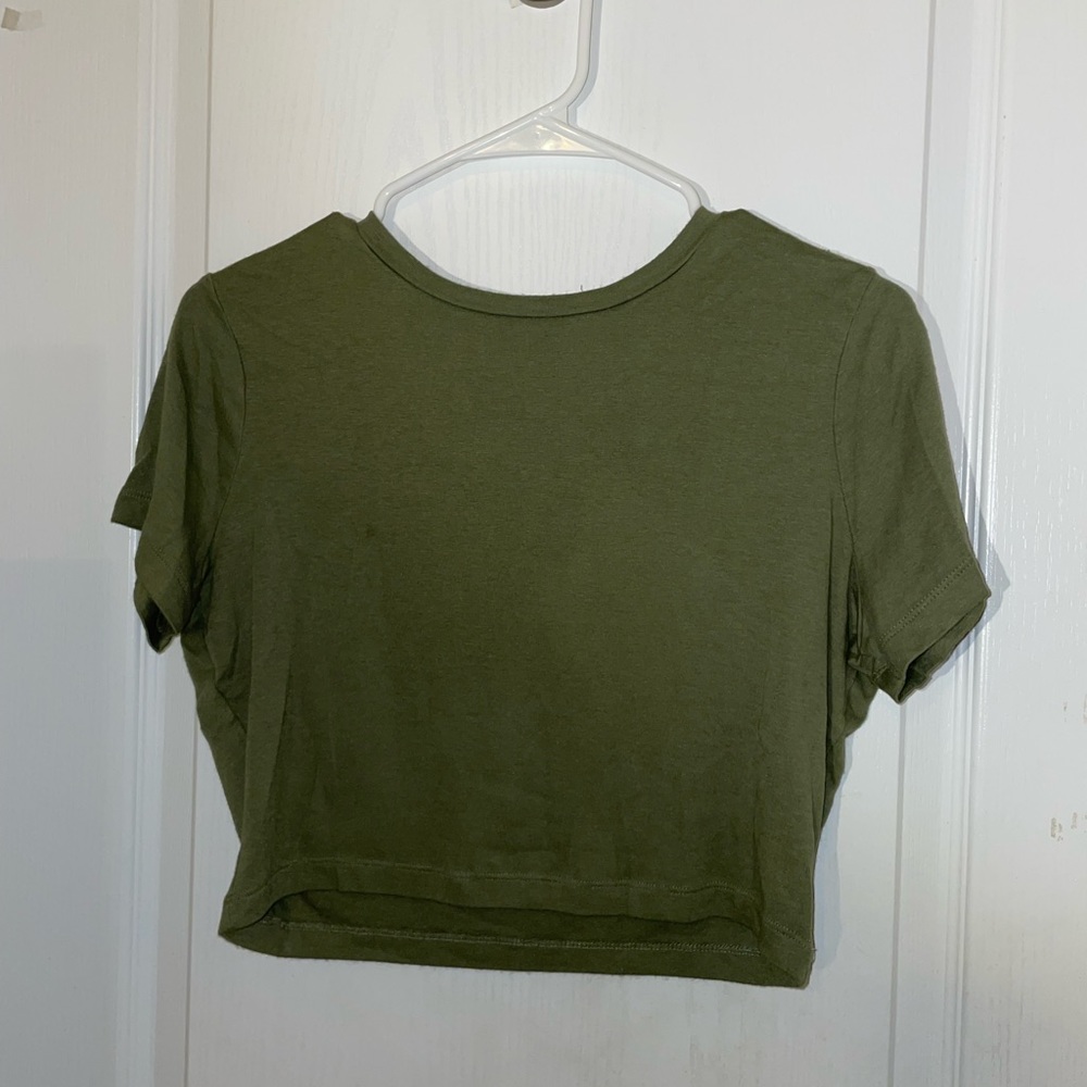 green cropped top